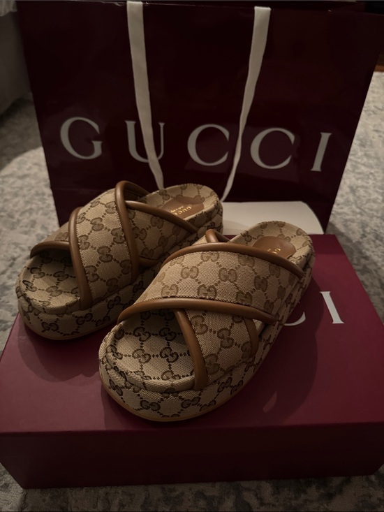 Gucci Shoes - Gucci Tan GG Canvas Crisscross Slide Sandals… Never worn!! Box, label, dust bag